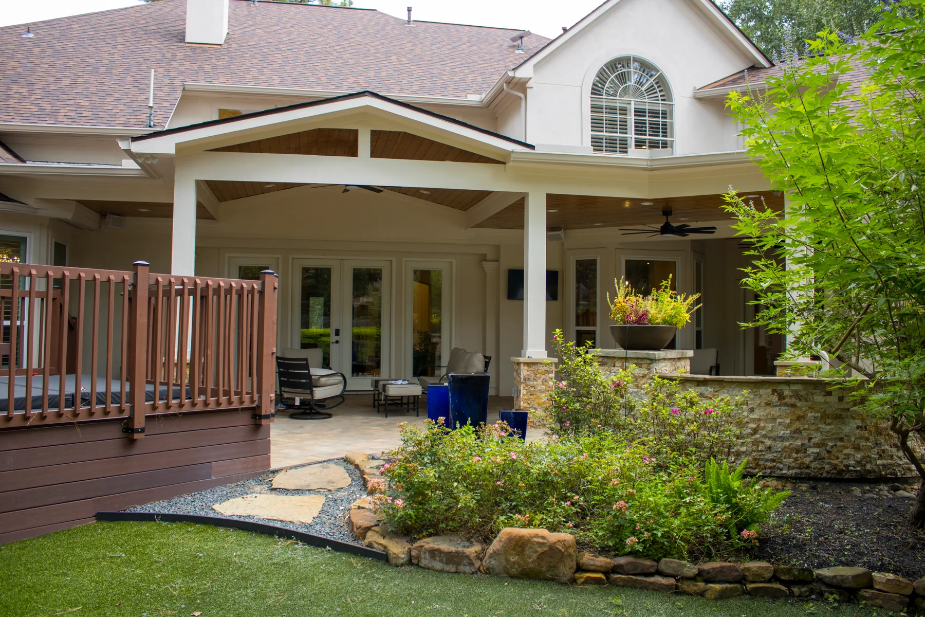 Multi-roofline patio cover built by Colony Builders at a River Oaks home