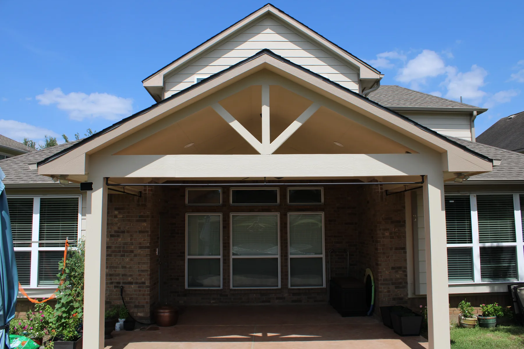 Patio slab and finished surface beneath the Sugar Land cover