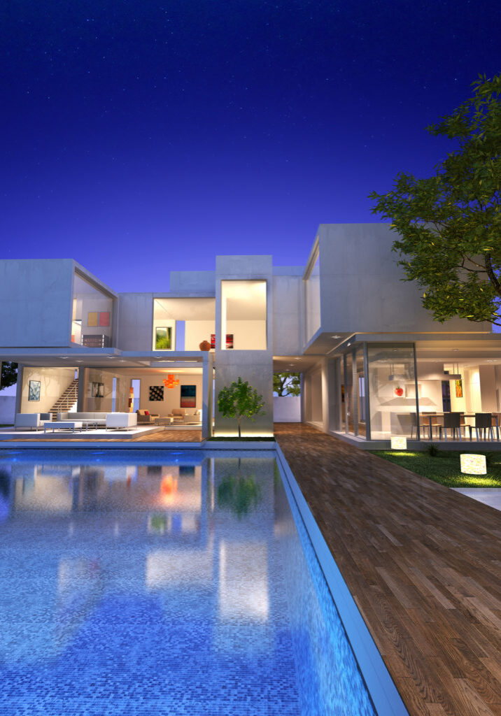 External view of a contemporary house with pool at dusk